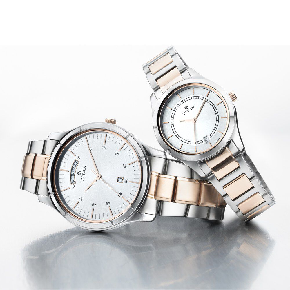 Titan Quartz Analog with Day and Date Silver Dial Stainless Steel Strap Watch for Couple 17672596KM01