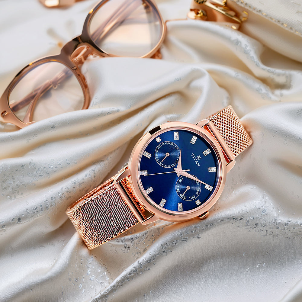 Titan Sparkle Quartz Analog with Day and Date Blue Dial Watch for Women