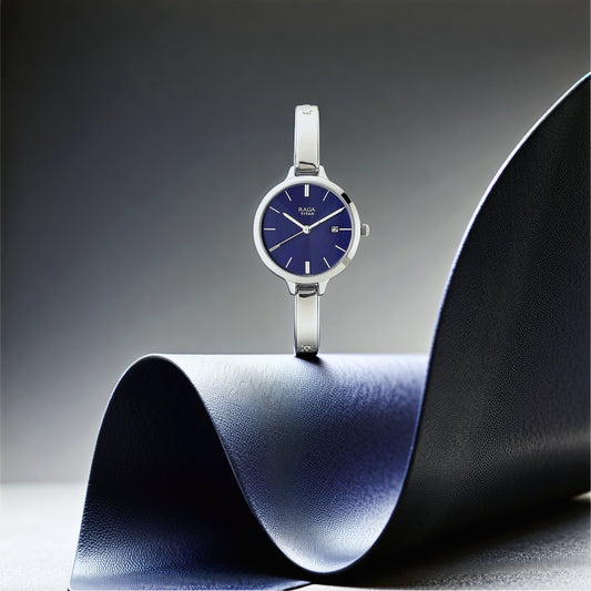 Titan Raga Viva Blue Dial Analog with Date Metal Strap Watch for Women 2578SM01